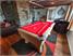 Supreme Winner Pool Table - Oak Finish - Red Cloth - Installation