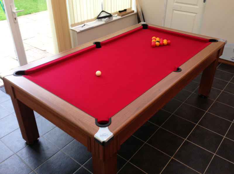 Optima Oxford Pool Dining Table in Walnut with a Red Cloth