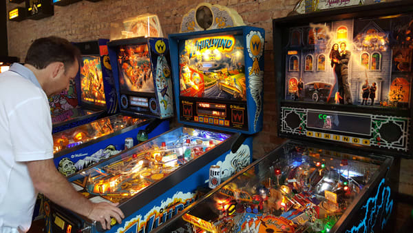 logans-barcade-andy-playing-pinball-machines.jpg