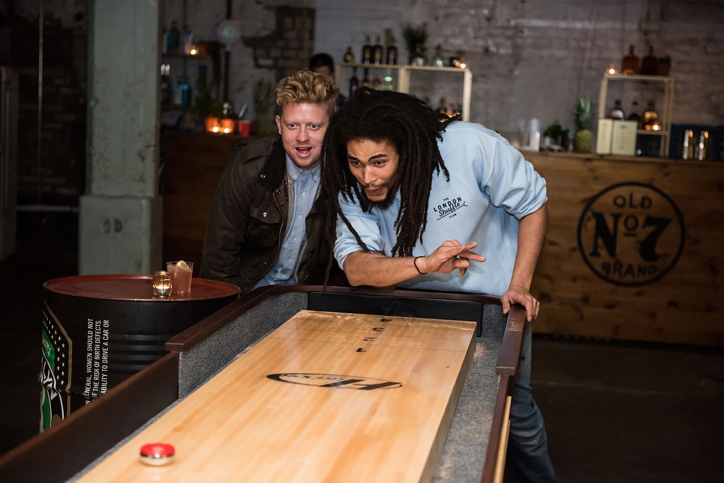 London Shuffle Club - Playing Shuffleboard