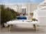 Diagonal Outdoor Pool Dining Table - White Finish - White Cloth - Lifestyle - Side 1