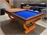 Signature Huntsman Pool Dining Table - Oak and Walnut Finish - Royal Blue Cloth with One Section of Dining Top In Use