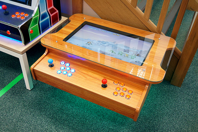 ArcadePro Triton Coffee Table Arcade Machine In Natural Wood In Showroom