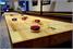 Signature Marlowe Shuffleboard Table In Dark Natural Oak - Playing Surface Close Up