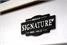 Signature Strickland American Pool Dining Table In White - Signature Badge