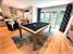 Signature Strickland American Pool Dining Table in Grey and Oak - Installation