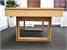 Signature Burton Wood Bed Pool Dining Table in Oak - Low Angle End View