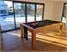 signature-chester-pool-dining-table-oak-finish-black-cloth-installation-2.jpg