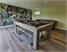 Signature Warwick Pool Dining Table - Grey Oak Finish - Black Cloth - Installation