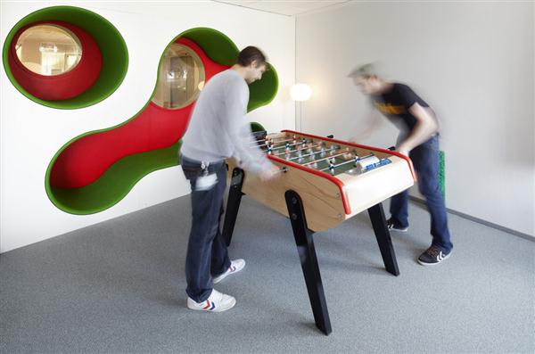 Office Workers Games Room Playing Foosball